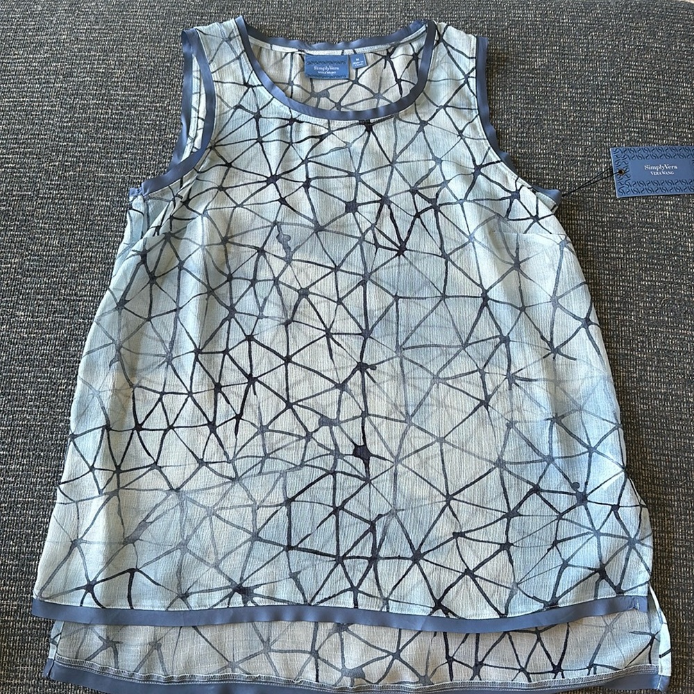 Sheer Vera Wang top.